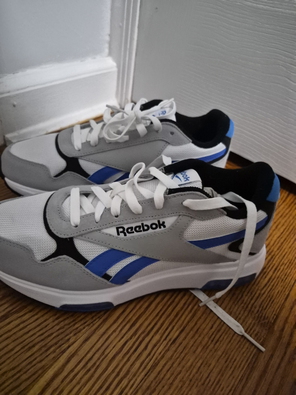 Reebok Menโs White, Gray & Blue Athletic Sneakers